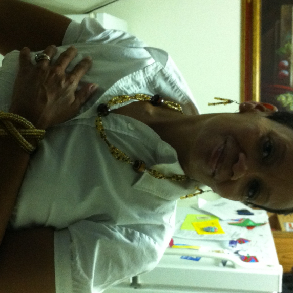 Kiki Wearing Brown Colored Triplicate Set kikimercer-jewelry2.jpg